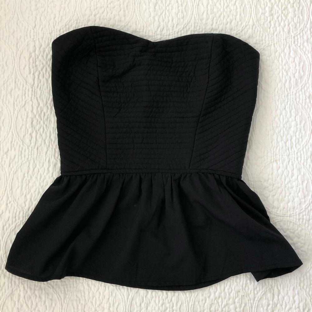 Black strapless peplum top